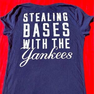 Yankees / pink women’s medium  v neck tee .